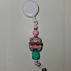 Pink and Green Halloween Themed Badge Reel